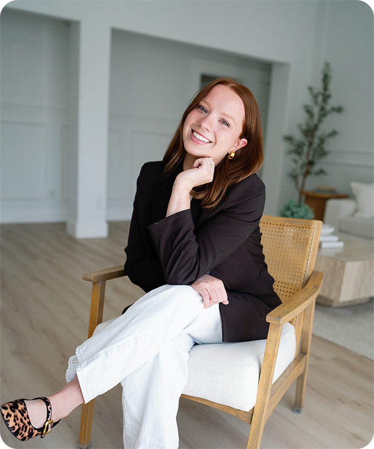 Maddie sitting in a chair