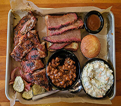 Sliced Texas style brisket with sides